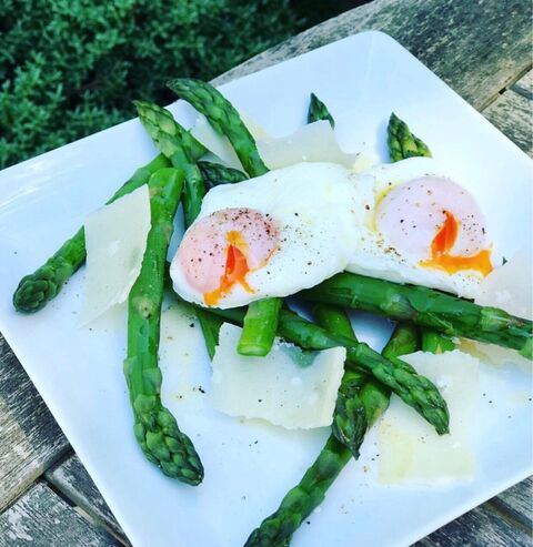Asparagus & poached eggs with Parmesan shavings and truffle oil.