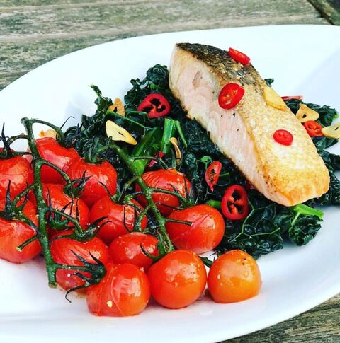 Pan Fried Salmon Cavolo Nero with Chilli & Vine Roasted Tomatoes